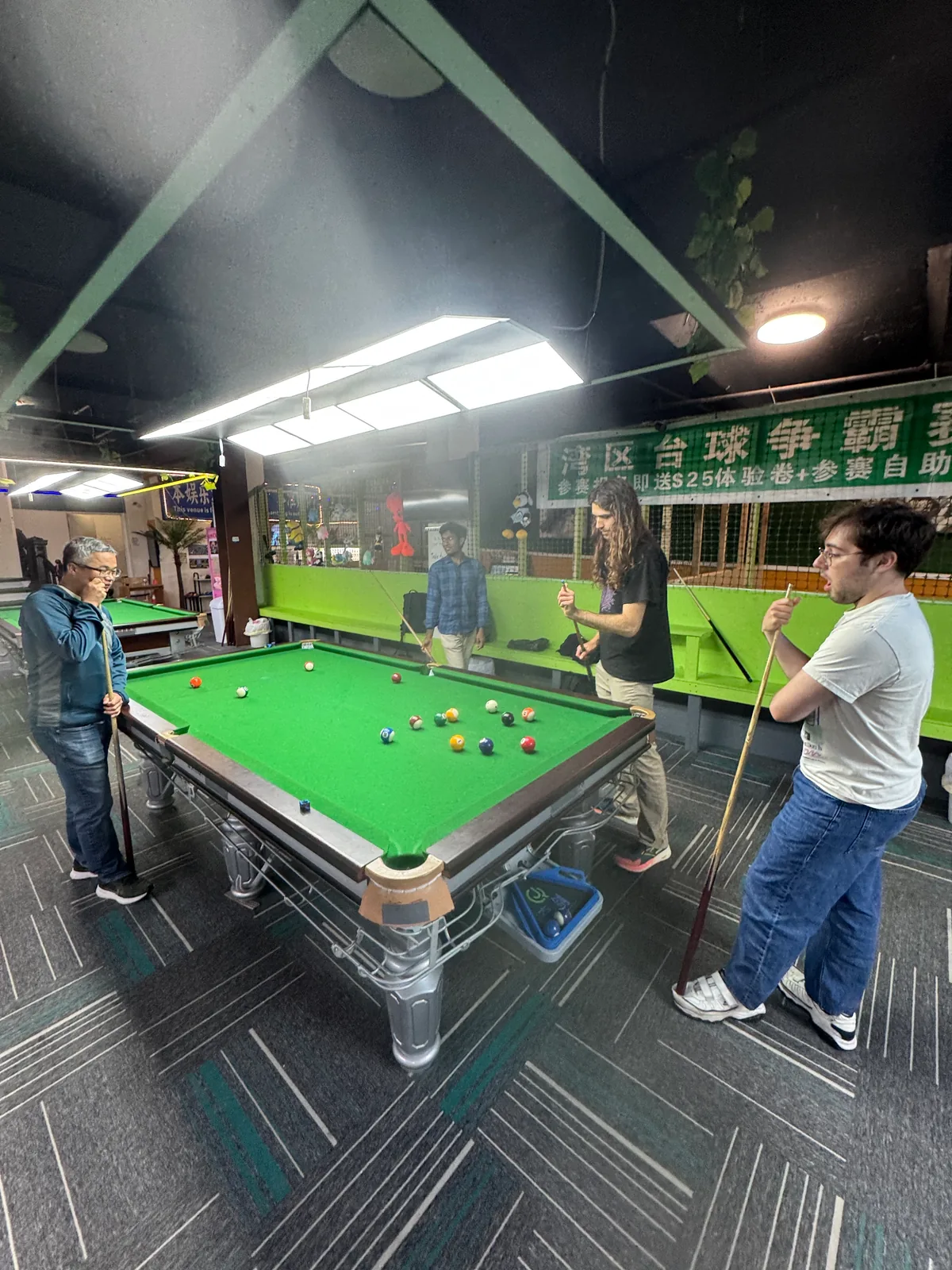 The Thunder Compute team playing pool together